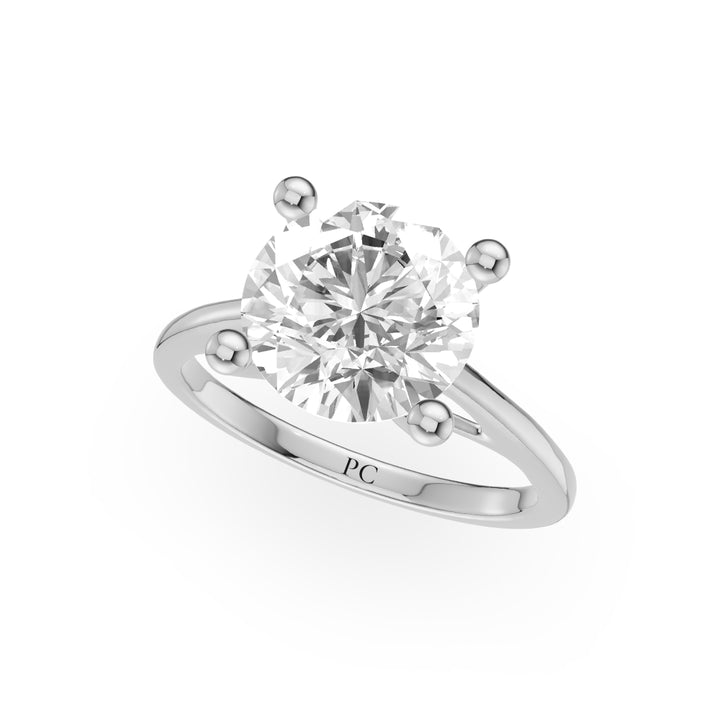 Snap Tapered Shank Solitaire Engagement Ring in Round White Gold