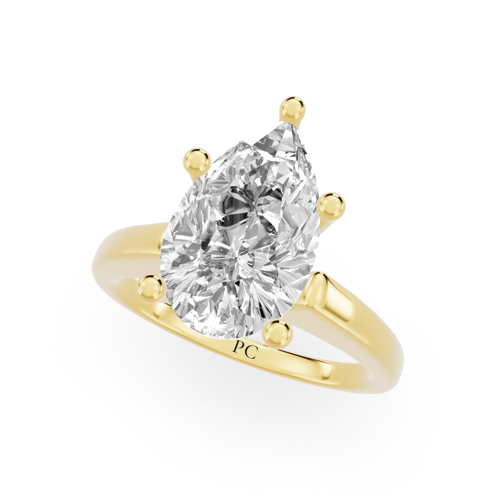 Grandeur Solitaire Engagement Rings in Pear Yellow Gold