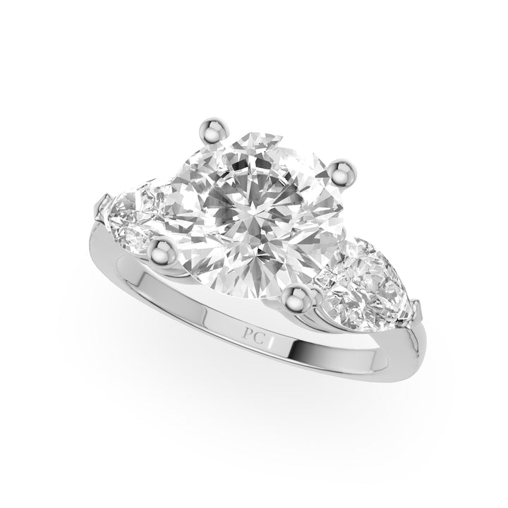 Denty Three Stone Engagement Ring