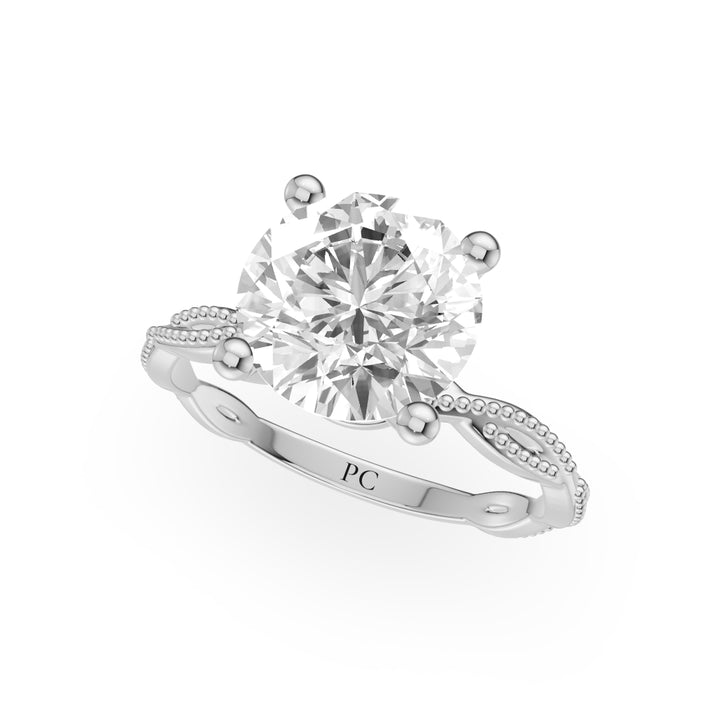 Tia Twisted Engagement Ring in Round White Gold