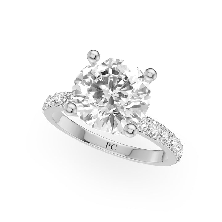 Lucy Hidden Halo Engagement Ring in Round White Gold