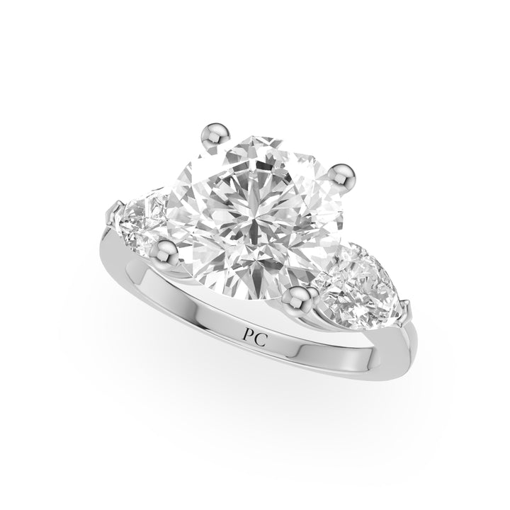 Denty Three Stone Engagement Ring in Round White Gold