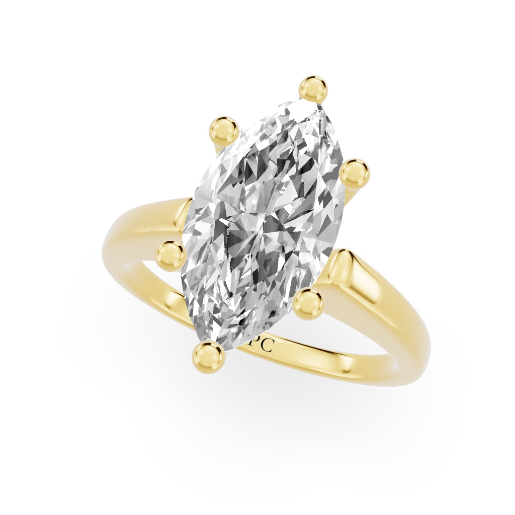 Grandeur Solitaire Engagement Rings in Marquise Yellow Gold