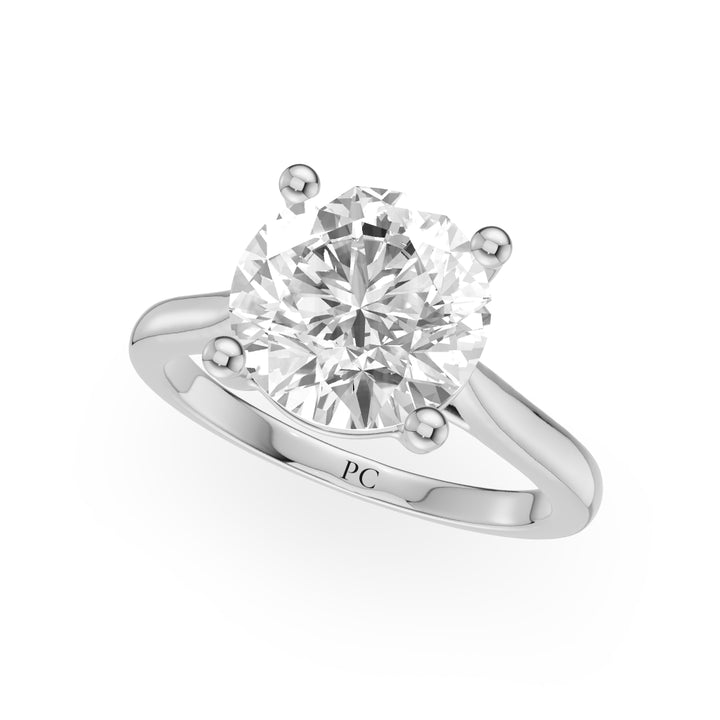 Natalia Princess Cut Tapered Engagement Ring in Round White Gold