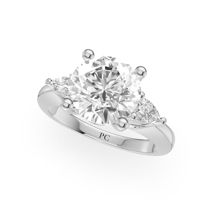 Birdie Three Stone Engagement Ring