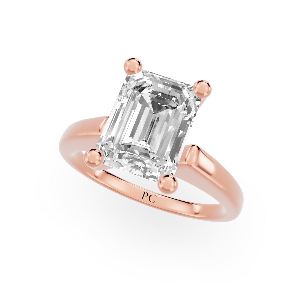Grandeur Solitaire Engagement Rings in Emerald Rose Gold