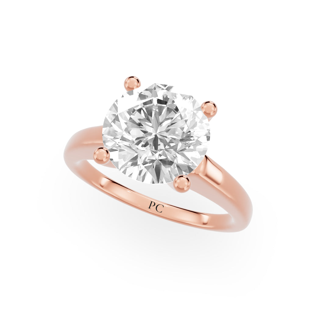 Grandeur Solitaire Engagement Rings in Round Rose Gold
