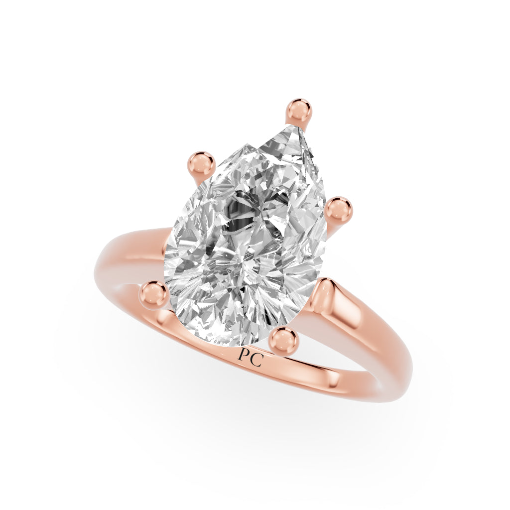 Grandeur Solitaire Engagement Rings in Pear Rose Gold
