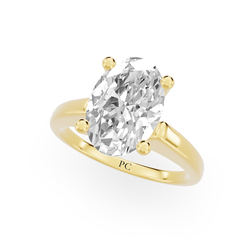 Grandeur Solitaire Engagement Rings in Oval Yellow Gold