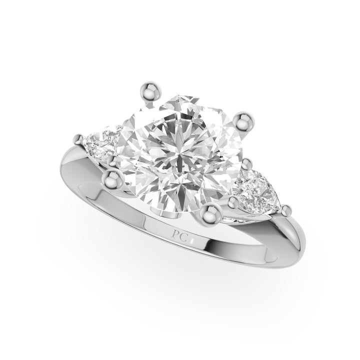 Birdie Three Stone Engagement Ring