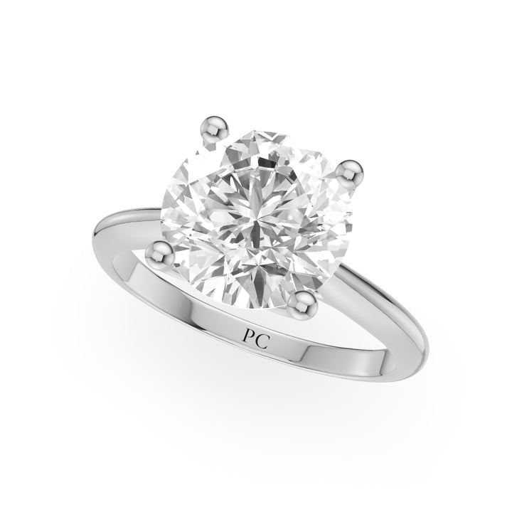 Eva Leaf Solitaire Engagement Ring in Round White Gold
