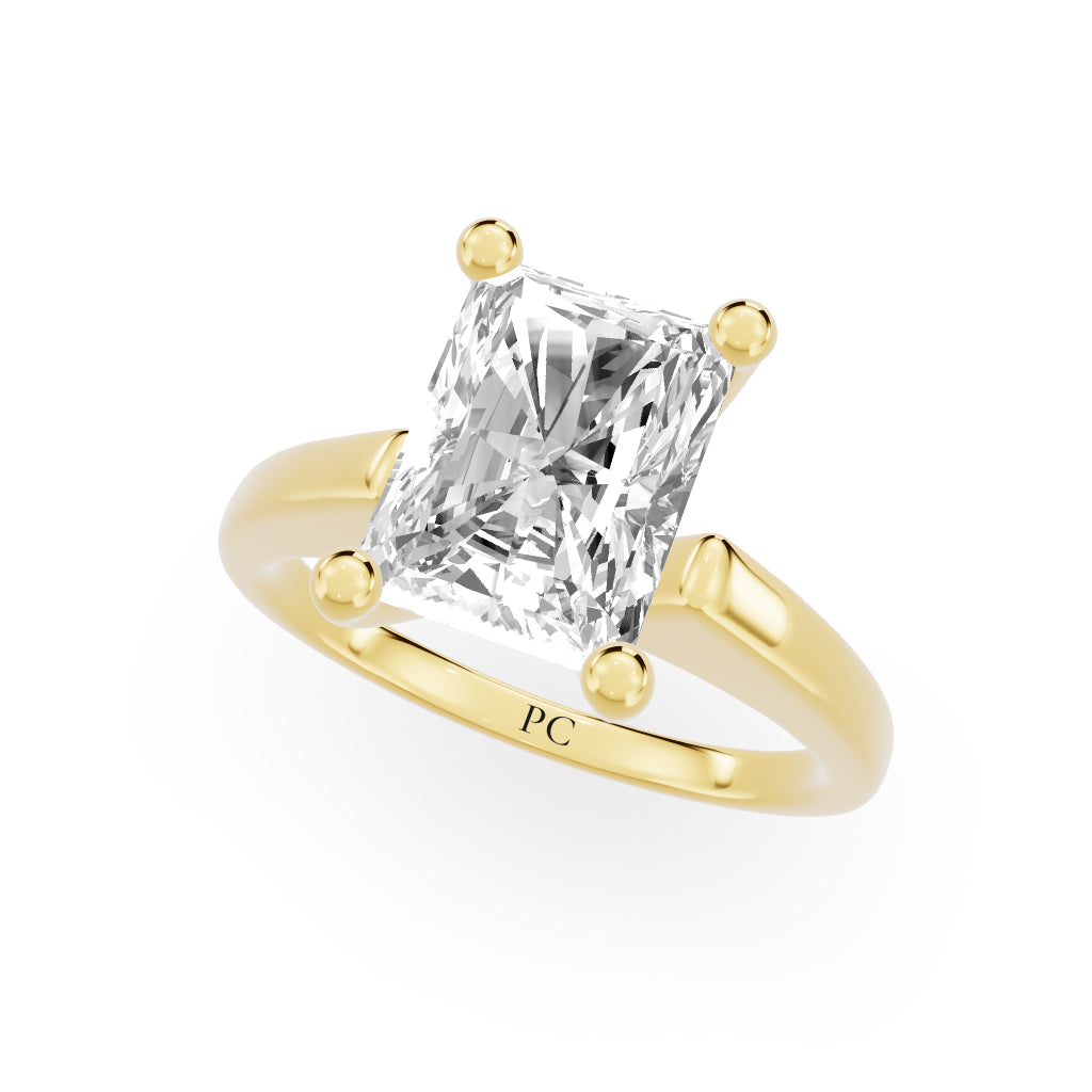Grandeur Solitaire Engagement Rings in Radiant Yellow Gold
