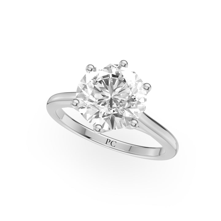 Tammy Six Prong Oval Solitaire Engagement Ring in Round White Gold