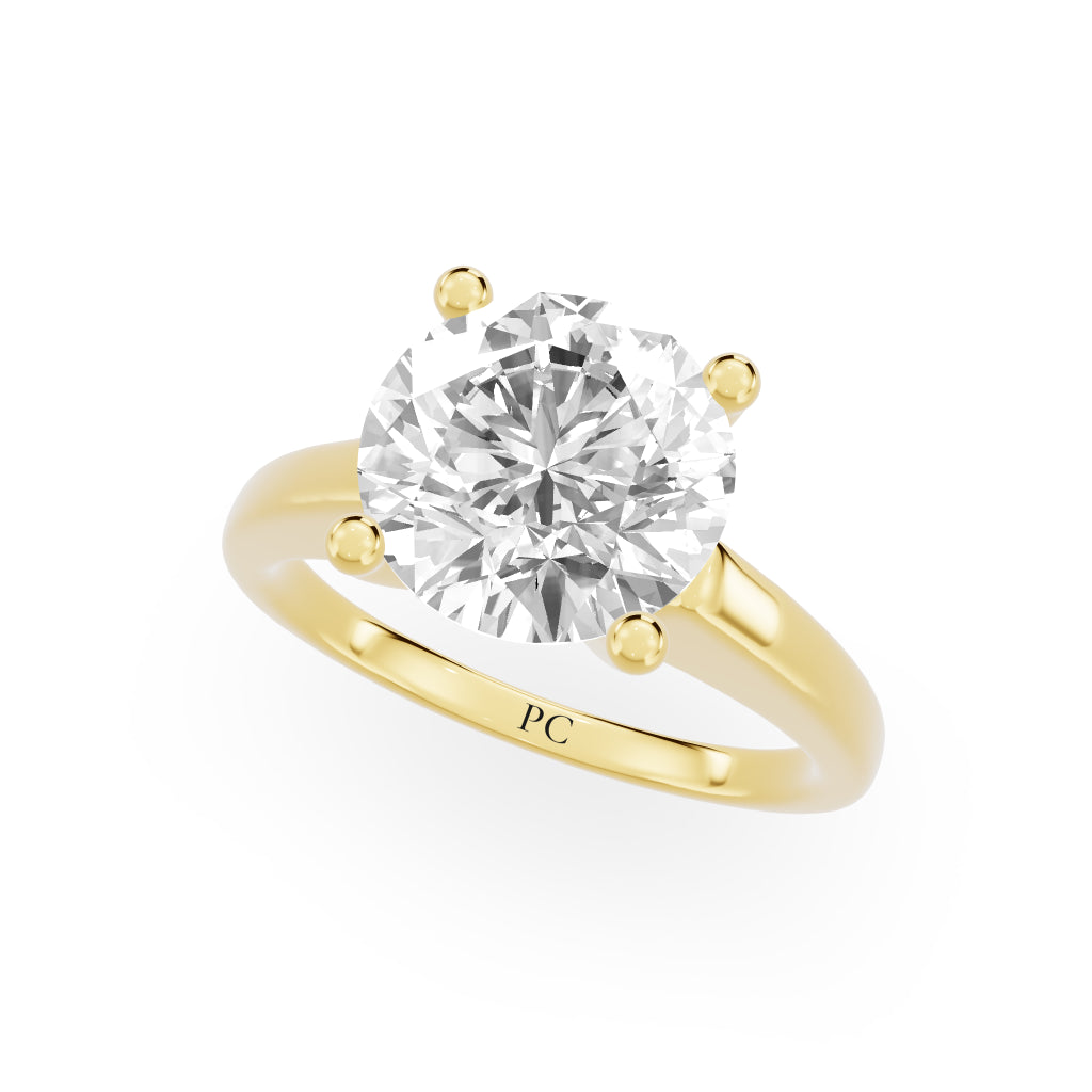 Grandeur Solitaire Engagement Rings in Round Yellow Gold